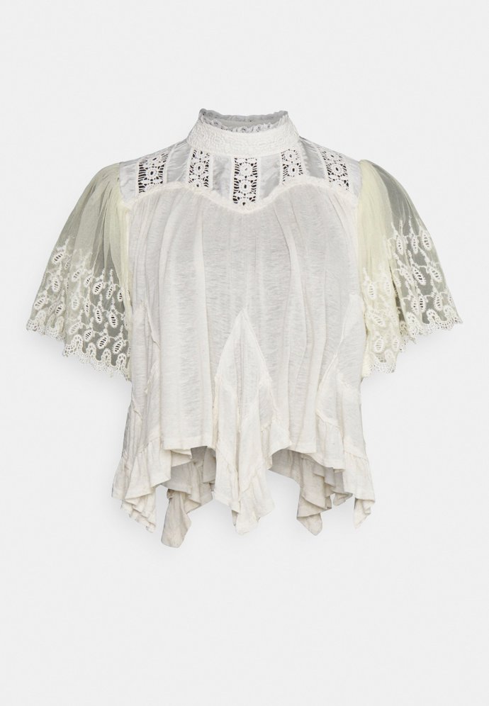 Návrat starých časů. To je halenka s romantizujícími prvky zn. FreePeople za 1 890 Kč.