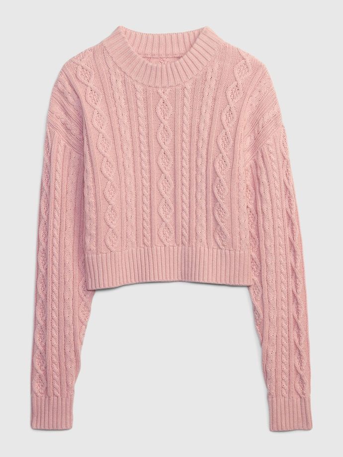 Zkrácená verze je vhodná k vrstvení, nosit lze ale i s volánkovou sukní či k džínám. (GAP, 1 599 Kč)