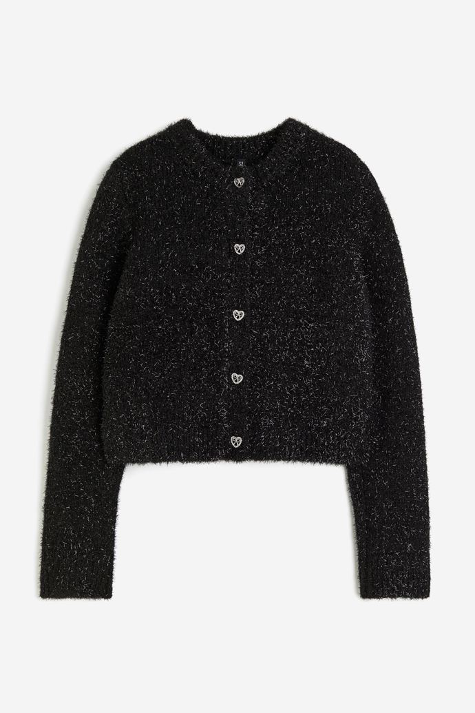 Doplnit jej může třpytivý kardigan s ozdobnými knoflíky. (H&M, 949 Kč)