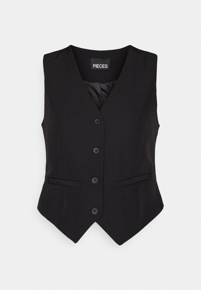 Místo topu či tílka můžete současný look fanouška Depeche Mode znalého souvislostí vyměnit za vestu na holé tělo. (Pieces, 1 020 Kč)