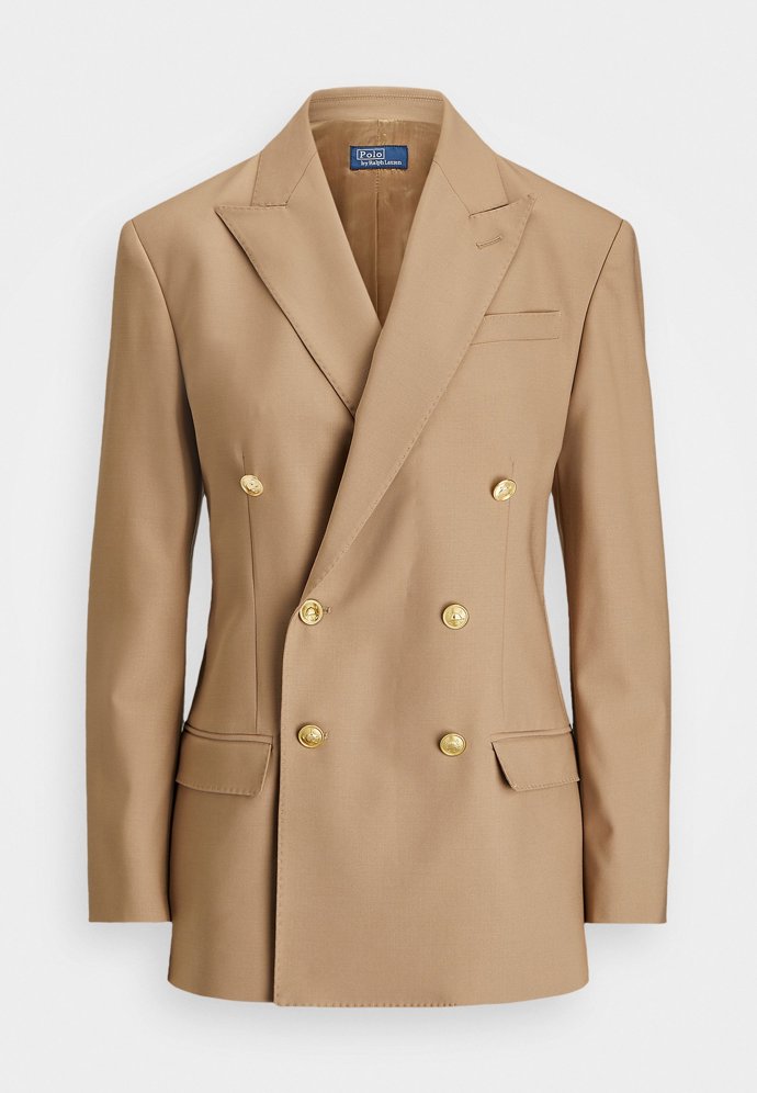 Zaujmete ale i v zemitých tónech. Těmi okořenil svou kolekci módní dům Ralph Lauren v řadě POLO.(Sako, 15 190 Kč)