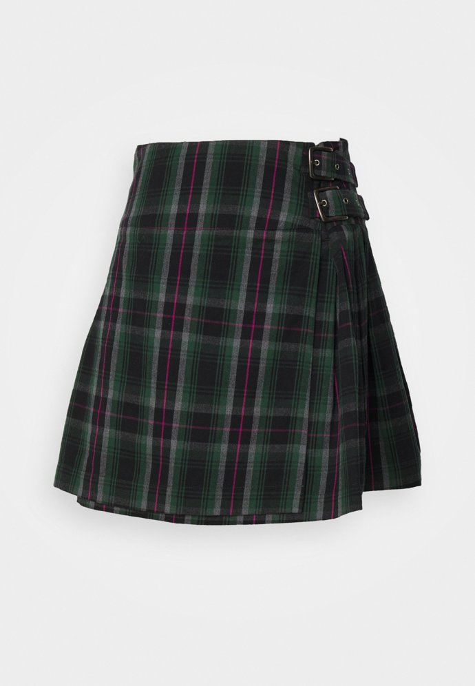 Skládaná sukně vévodí mnoha stylům současnosti, a grunge je jedním z nich. (Jaded London, 2 180 Kč)