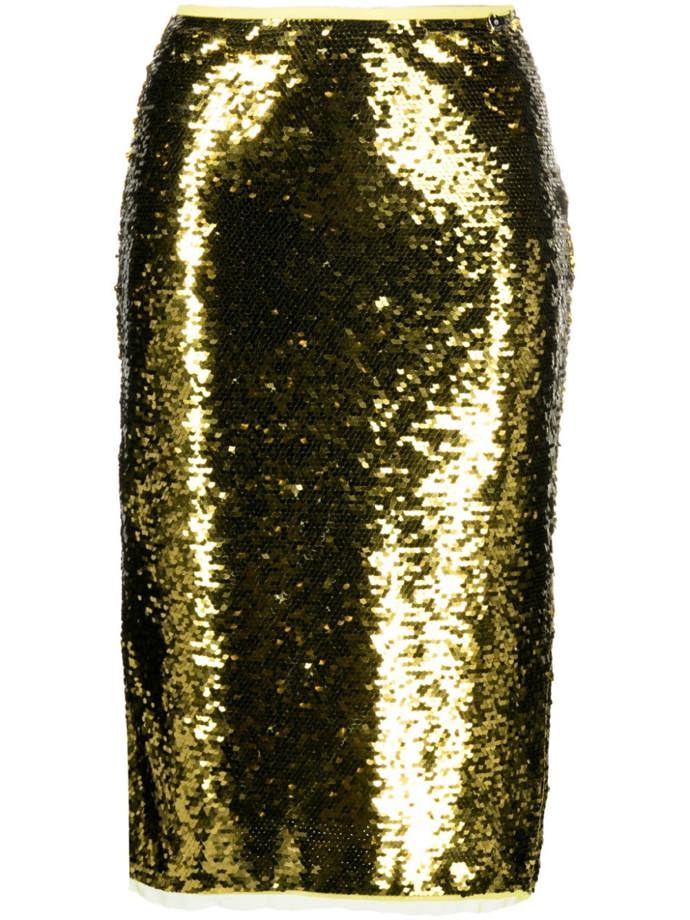 Nosí se i "pencil skirt" pošitá flitry. (Liu Jo,2 190 Kč)