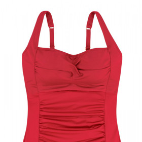 pokud hodláte do plavek skrýt i vzdouvající se bříško, pomůžou vám plavky s formujícím předním dílem a vyztuženými košíčky. (Triola, 1 390 Kč)