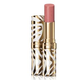 Pečující hydratační rtěnku v trendy broskvovém tónu najdete také u značky Sisley. Lesklá rtěnka s hydratačním účinkem, Phyto Rouge Shine, Sisley stojí 1 060 Kč.