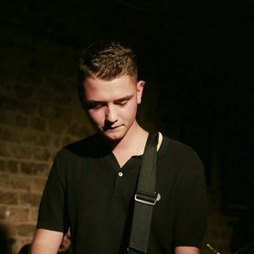 Baví ho také hrát na kytaru a zpívat v punkové kapele Outer Stella Overdrive.