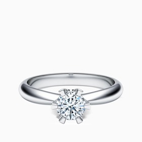 Zásnubní prsten z bílého zlata s centrálním kamenem, Korbička, od 14 500 Kč