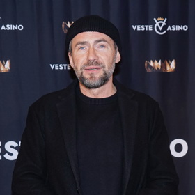 V chladnějším počasí Bořek Slezáček volí elegantní kabáty i stylové čepice.