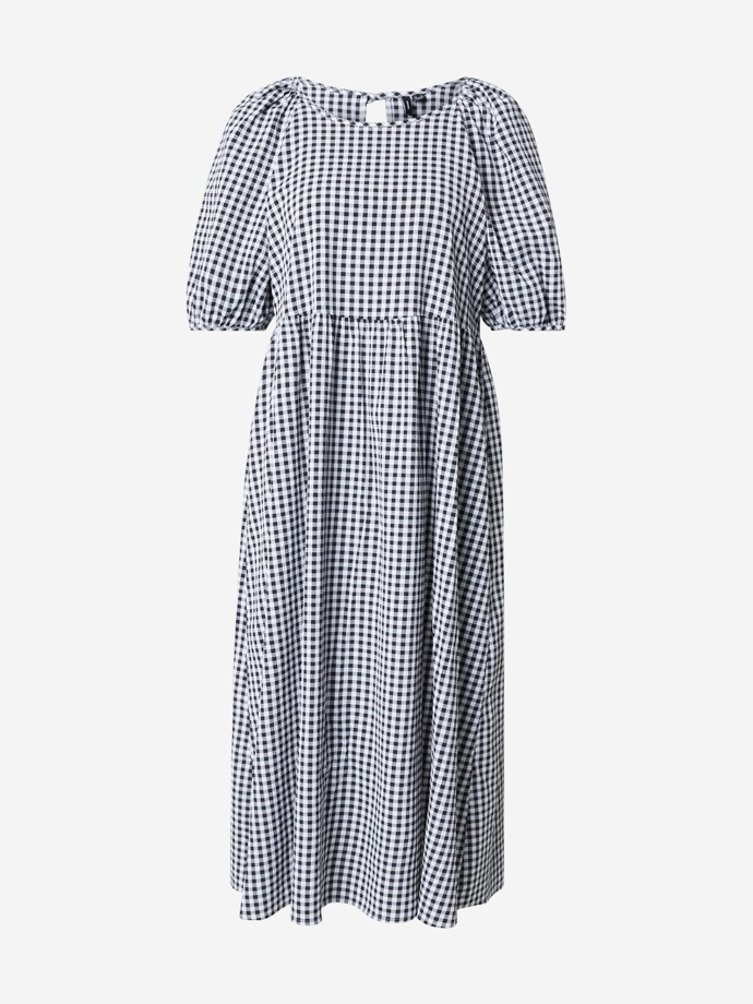 Podobné černobílé kostkované šaty prodává například Vero Moda za 1329 Kč.