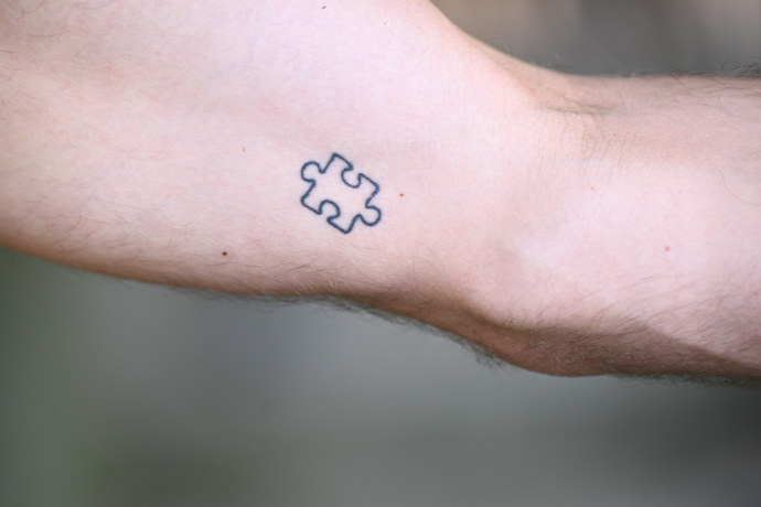 Jiří a jeho tetování puzzle.