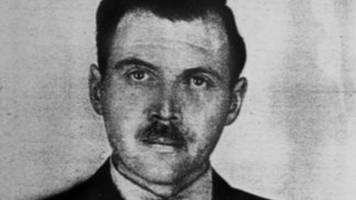 Sadistický nacistický "lékař" Josef Mengele. V koncentračním táboře se mu říkalo Anděl smrti.