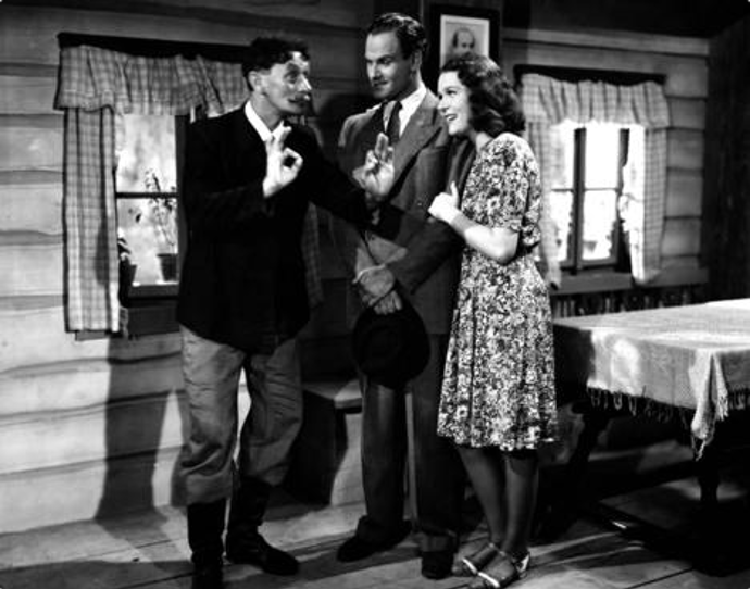 Ryba na suchu: Majitel půjčovny lodiček a převozník v jednom jménem Ryba (Vlasta Burian, vlevo) již zachránil nejednoho plavce či sebevraha. Poklidný život mu ale brzy nabourá inženýr Pánek (Vítězslav Vejražka, uprostřed), který je pověřen regulací řeky.