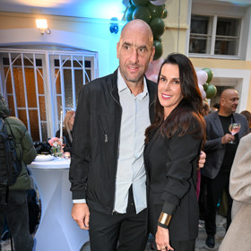 Jan Koller s partnerkou.