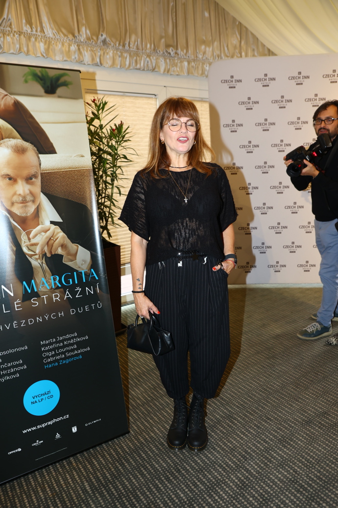 Marta Jandová na křtu Štefana Margity. 