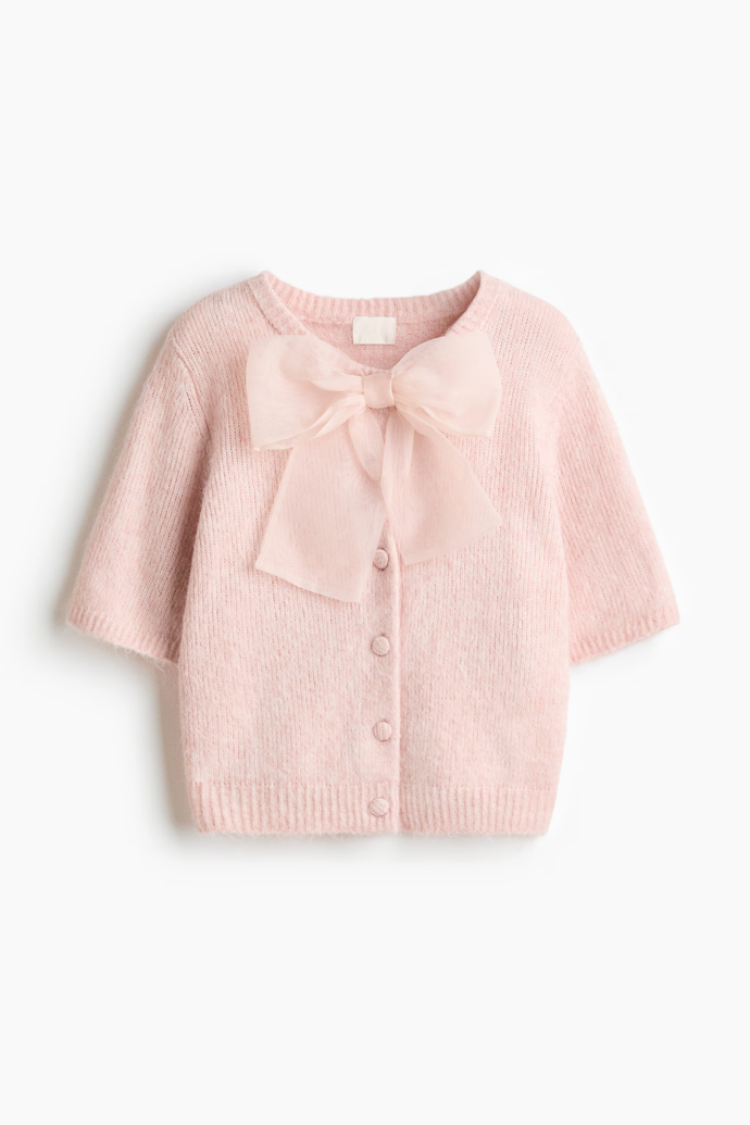 Pletený propínací svetřík s mašličkou, H&M, 739 Kč