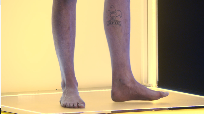 Tetování ze Simpsonů.