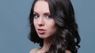 žena