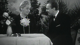 Ella Nollová a Karel Höger. Čtrnáctý u stolu (1943)