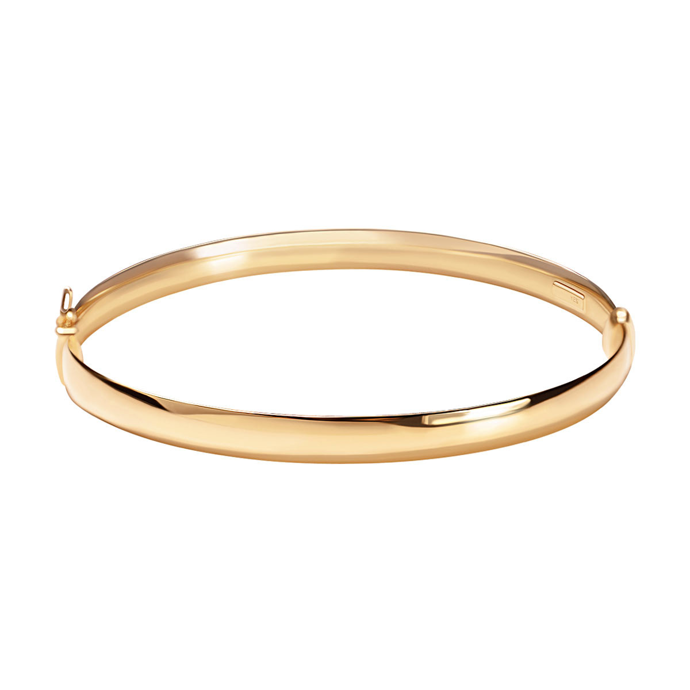 S náušnicemi stylově krásně ladí tento pevný zlatý náramek. Je od YES Jewellery a stojí 32 250 Kč.