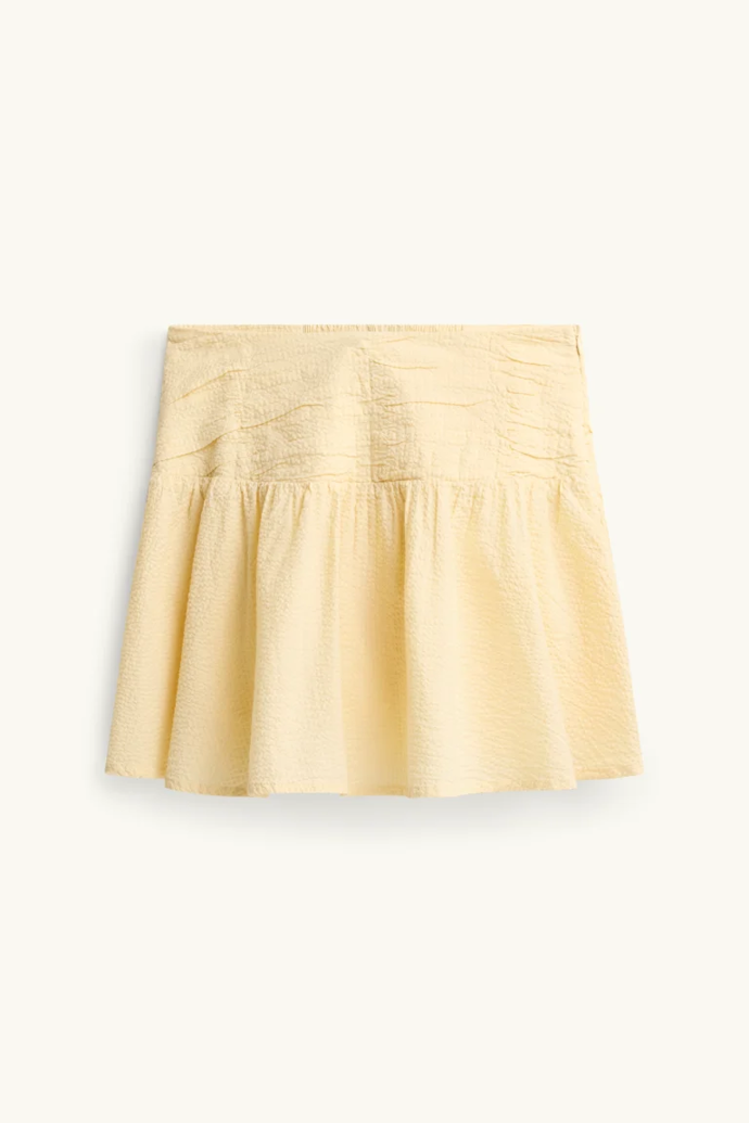 Strukturovaná minisukně, C&A, 398 Kč
