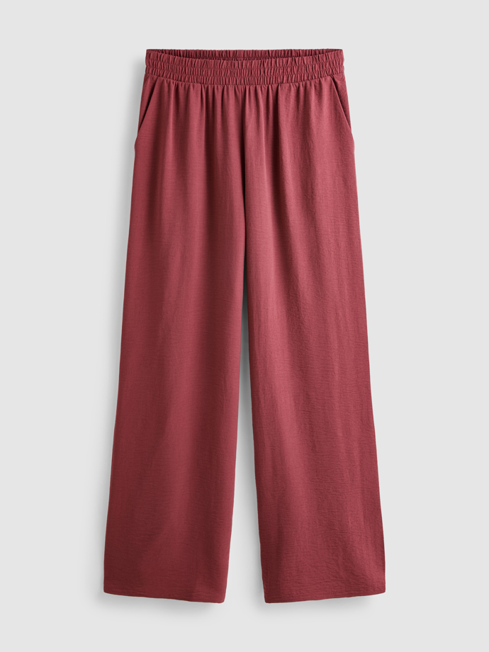 Splývavé kalhoty se širokými nohavicemi, středně vysokým elastickým pasem a bočními kapsami, Primark, 260 Kč