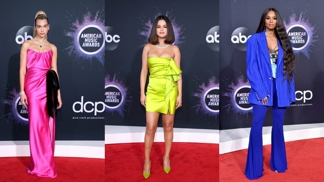 Zářivé barvy, květinové vzory i kostky. Co oblékly celebrity na American Music Awards?