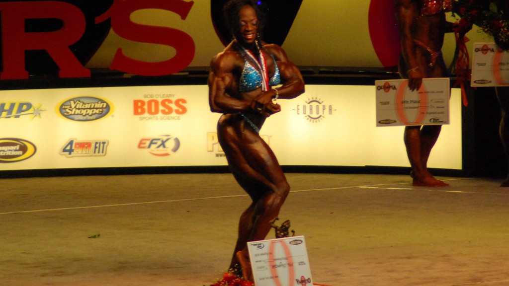 Iris Kyle v roce 2008 na soutěži.
Iris Kyle v roce 2008 na soutěži.