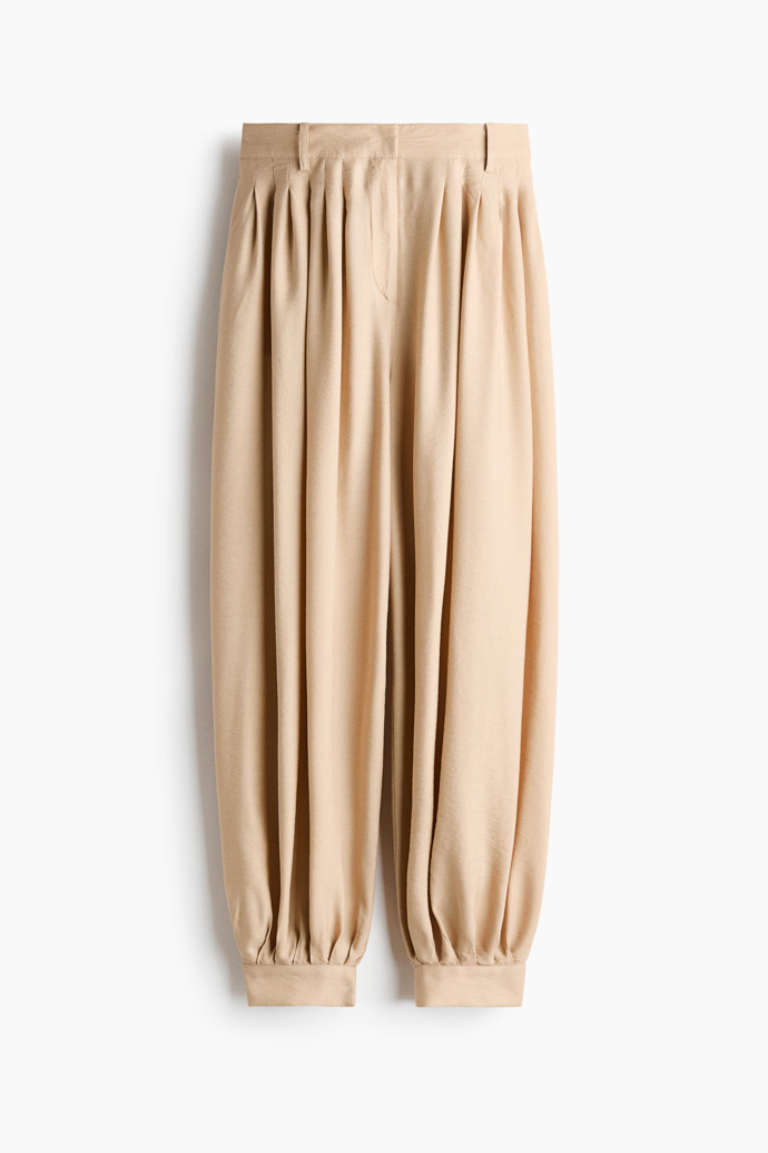 Balonové kalhoty se sklady, H&M,
979 Kč