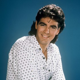 Stejně jako mullet, který George nosil v osmdesátých letech.