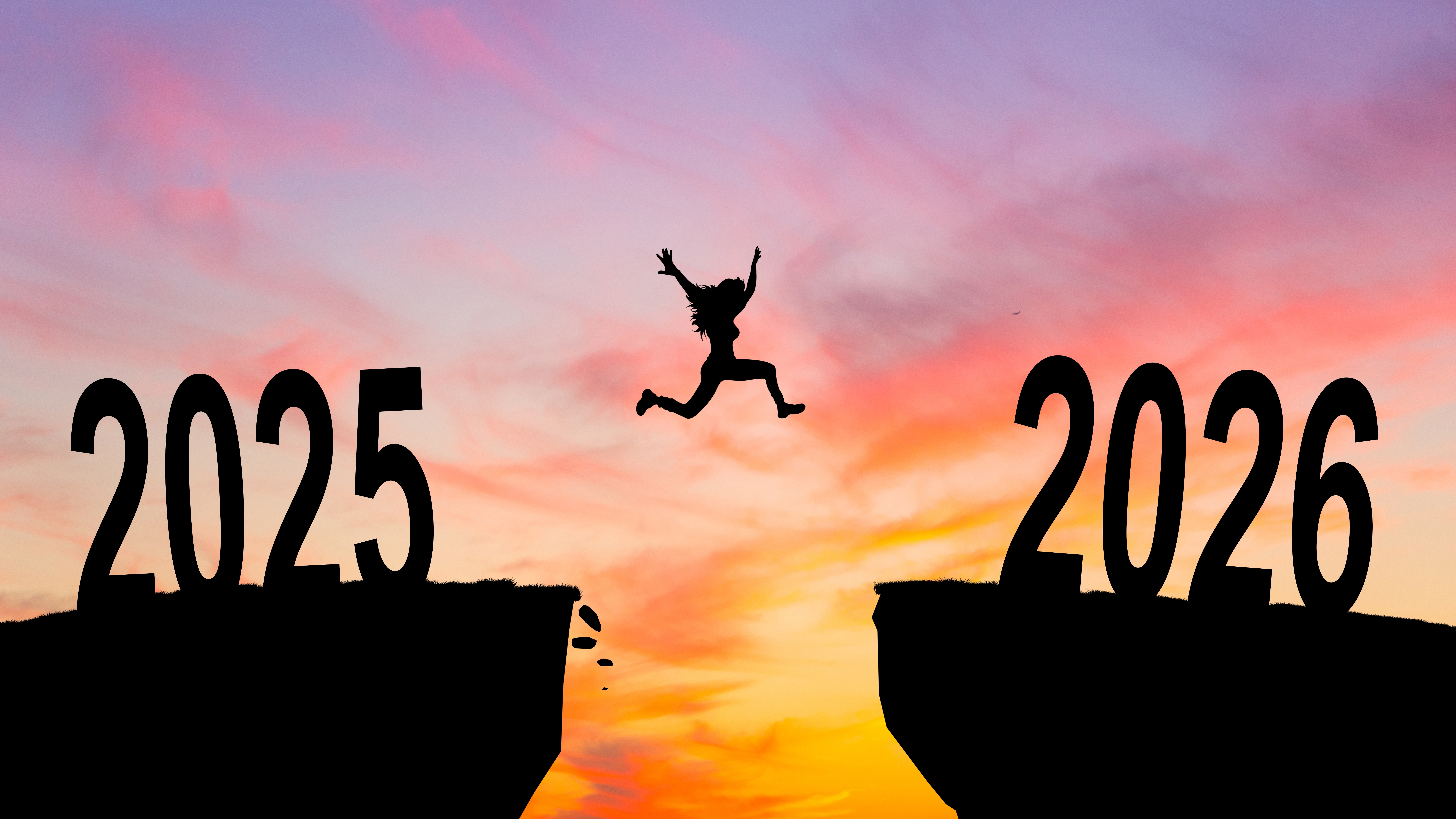 žena skáče z roku 2025 do 2026