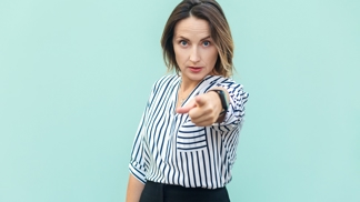 žena