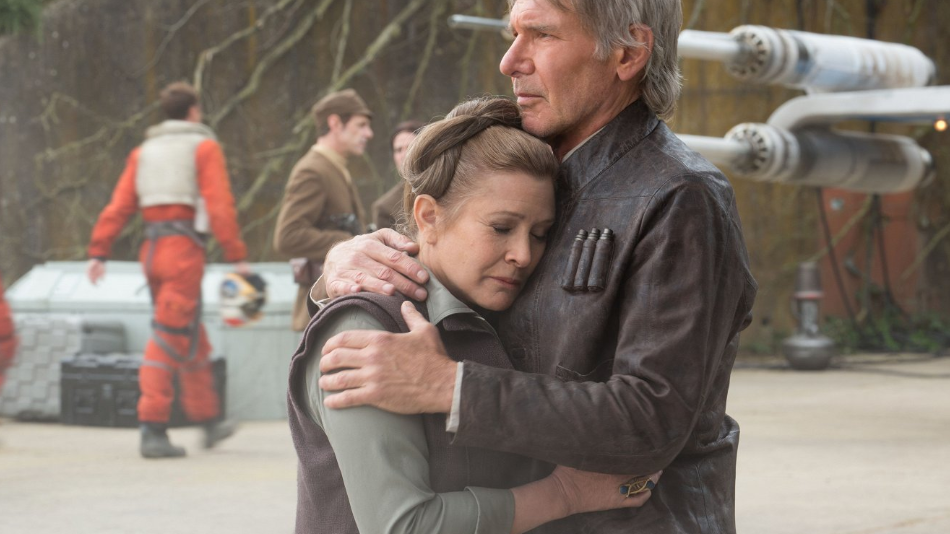 Carria Fisher a Harrison Ford ve filmu Star Wars VII - Sála se probouzí.