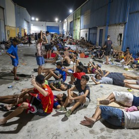 Imigranti v Ceutě.