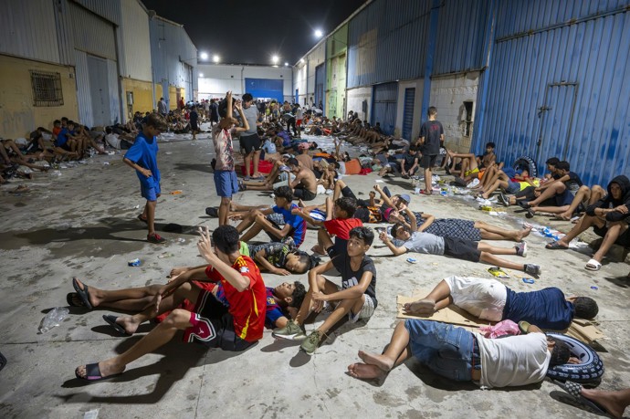 Imigranti v Ceutě.