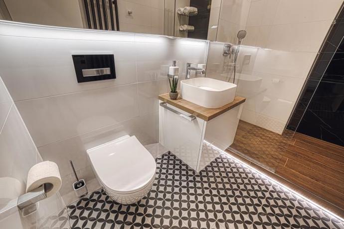 Takto může vypadat horský apartmán v roce 2026. Teplé barvy, minimum dekorací a spousta světla