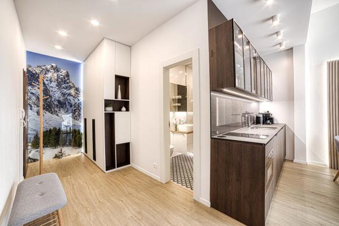 Takto může vypadat horský apartmán v roce 2026. Teplé barvy, minimum dekorací a spousta světla