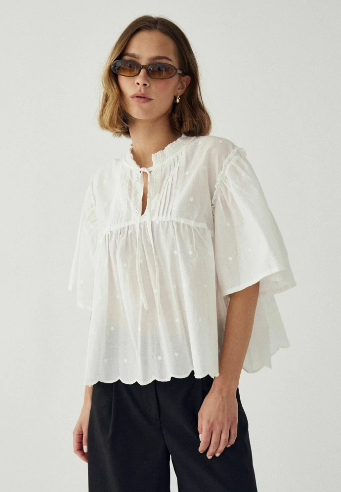 Noella, 1 350 Kč, prodává Zalando