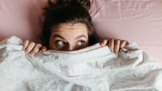 young woman with open eyes