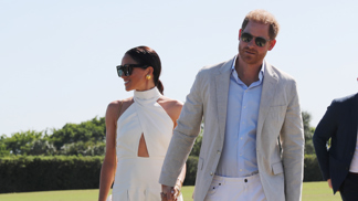  

Harry a Meghan na charitativní akci 
