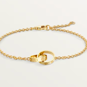 Zlatý náramek Cartier, 52000 Kč