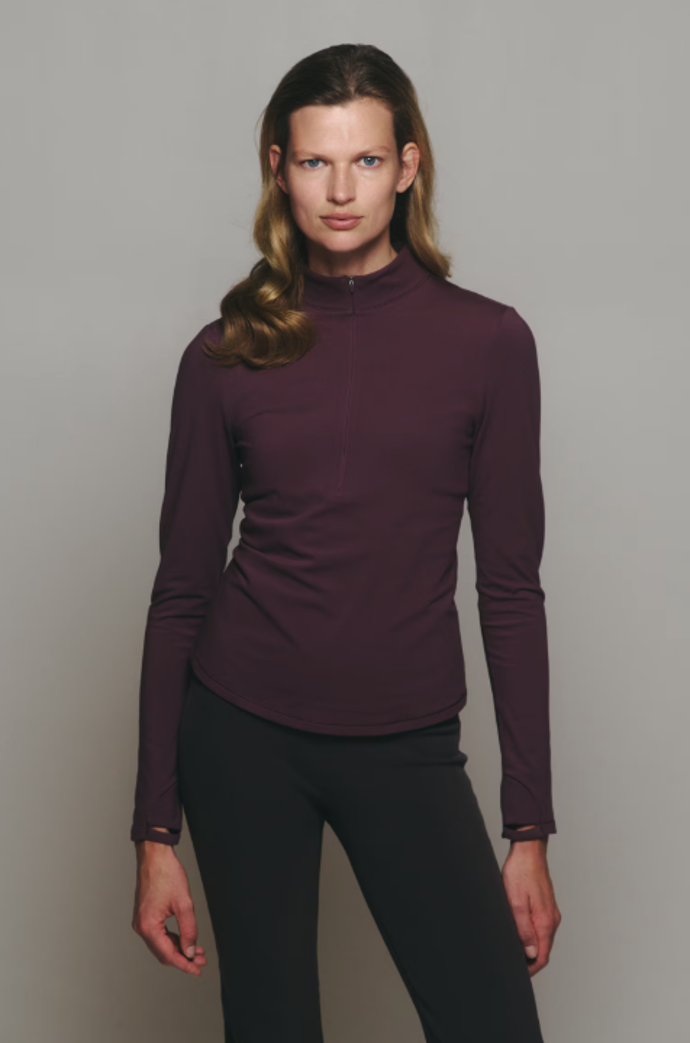Hřejivý sportovní top se stojáčkem H&M, 749 Kč Hřejivý sportovní top se stojáčkem H&M, 749 Kč